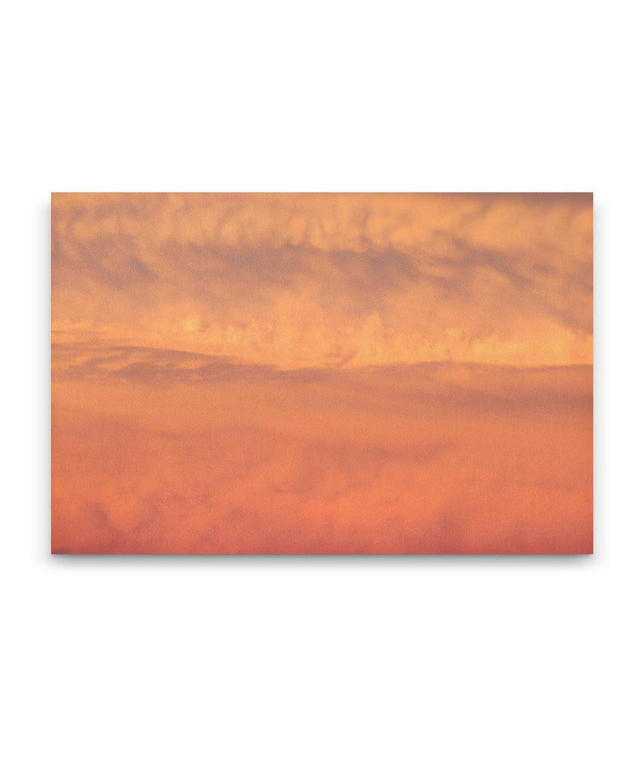 Orange-colored lenticular clouds at sunset, Carpenter Mountain, Oregon