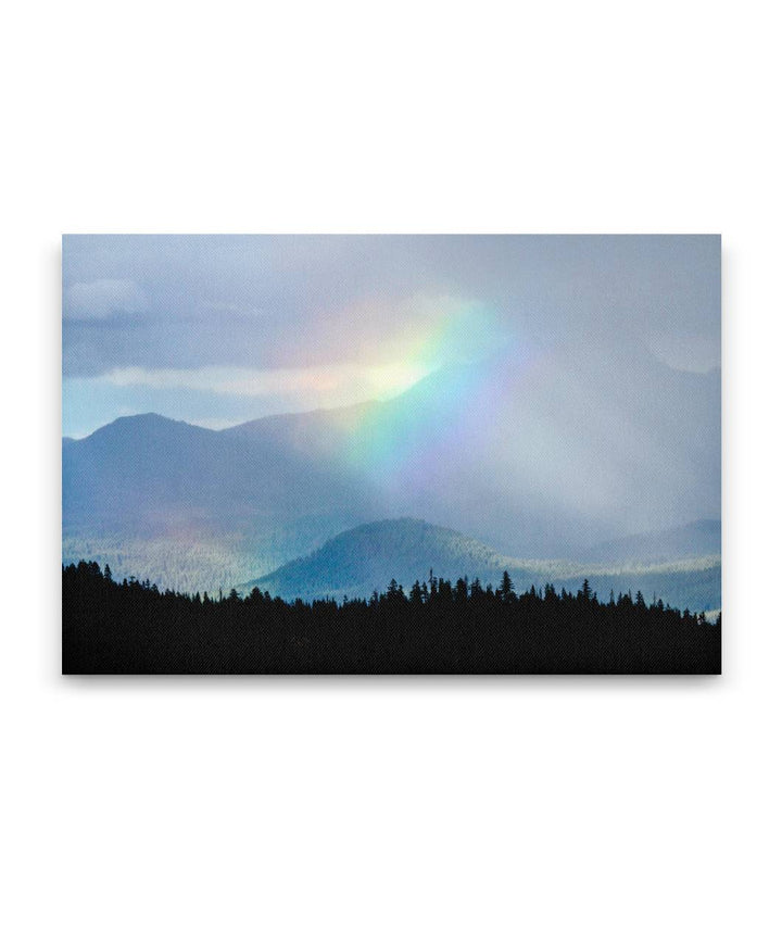 Three-fingered Jack and rainbow with Nash Crater, Mount Jefferson Wilderness, Oregon, USA